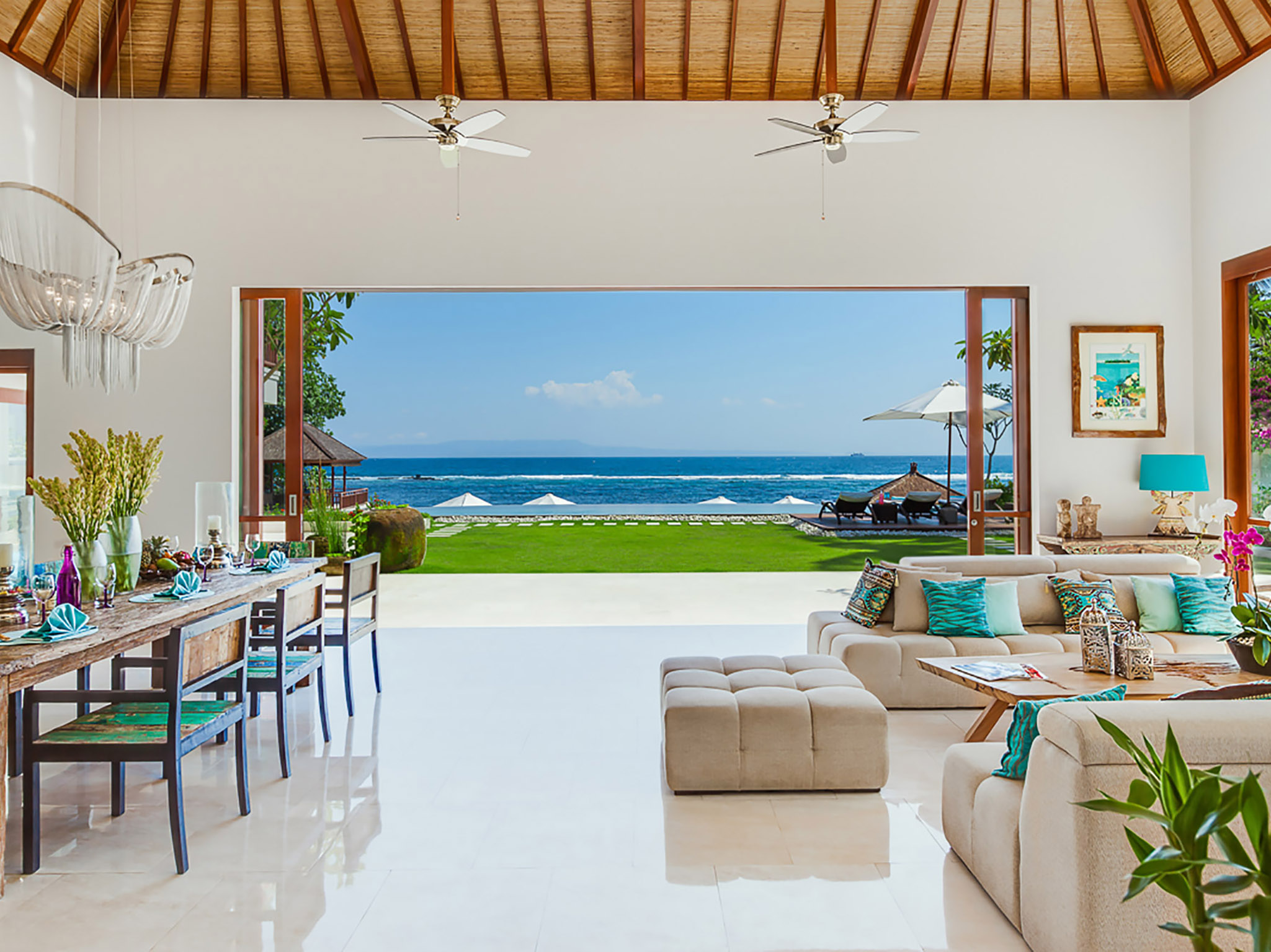 1. Villa Tirta Nila View of the ocean across the lounge