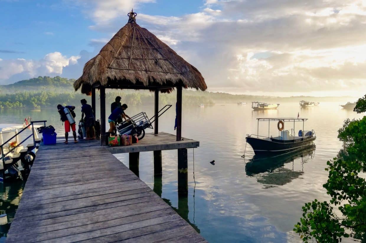 Jetty and small boat at sunrise 01 1240x826 1