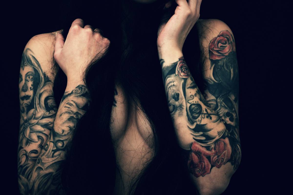 woman with tattoo on arms